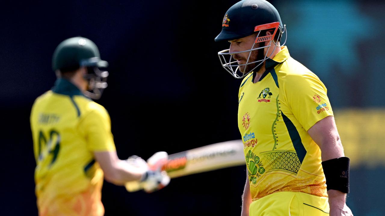 Finch walks off after being dismissed for five runs against Zimbabwe in their third ODI in Townsville.