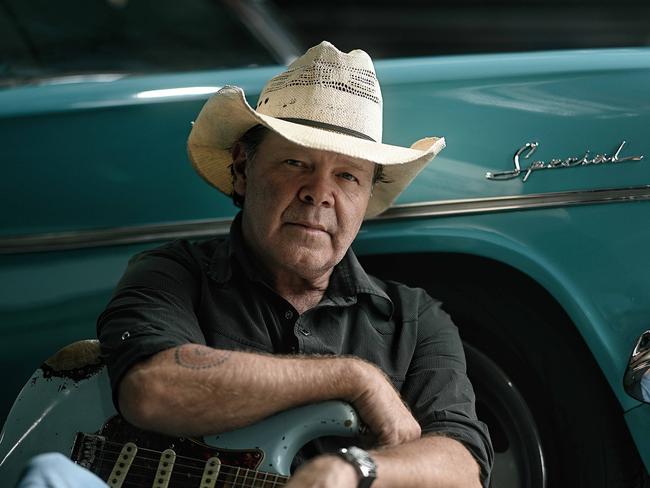 27/3/24 : Country singer-songwriter Troy Cassar-Daley, with his beloved EH Holden , at a workshop in Brendale, Brisbane. pic: Lyndon Mechielsen/The Australian