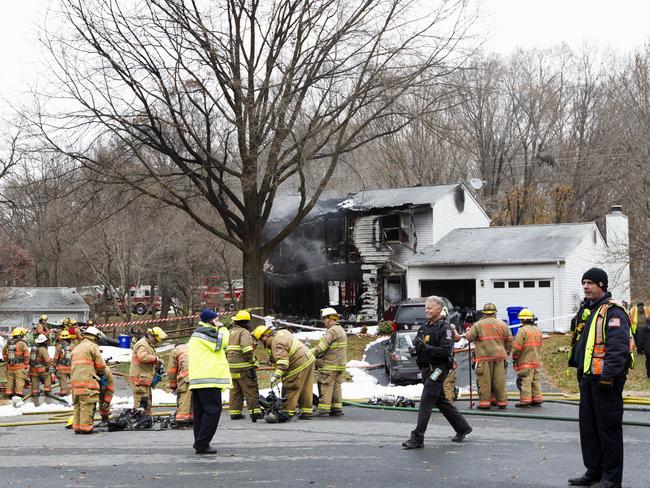 Several houses were alight and covered with debris. (AP Photo/Jose Luis Magana)