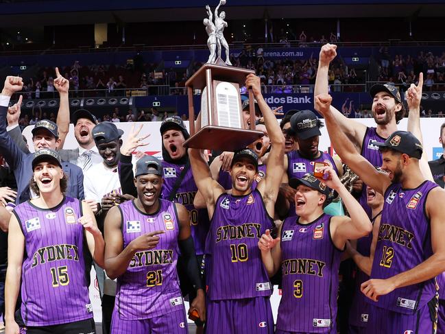 SYDNEY, AUSTRALIA - MARCH 15: The Sydney Kings pose with the Dr John Raschke trophy after winning game five of the NBL Grand Final series between Sydney Kings and New Zealand Breakers at Qudos Bank Arena, on March 15, 2023, in Sydney, Australia. (Photo by Mark Metcalfe/Getty Images)