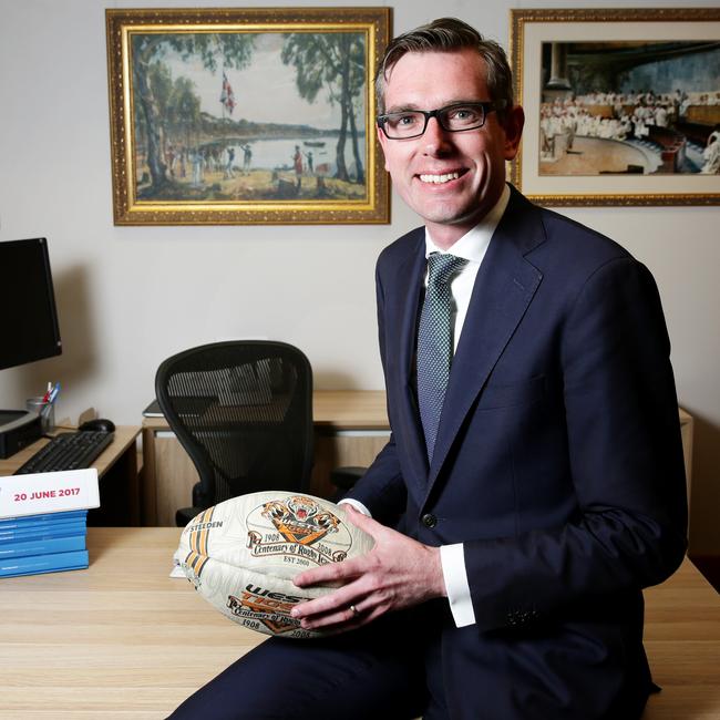 Dominic Perrottet at his office at state parliament with a West Tigers football. The Premier is reportedly a fan of the club. Picture: Mark Evans