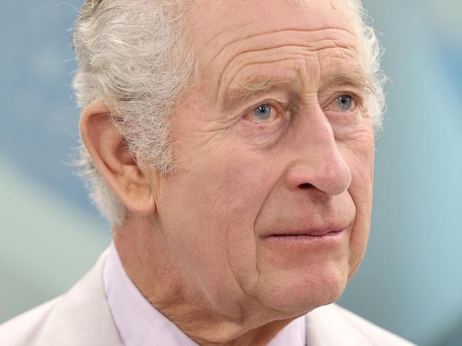 DUBAI, UNITED ARAB EMIRATES - NOVEMBER 30: King Charles III watches a presentation during a visit at the Heriot-Watt University to formally open the Dubai campus during COP28 on November 30, 2023 in Dubai, United Arab Emirates. The King is visiting Dubai to attend COP28 UAE, the United Nation's Climate Change Conference. (Photo by Chris Jackson/Getty Images)