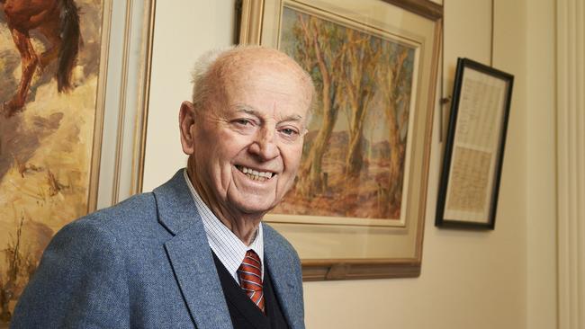 Auctioneer Jim Elder with Sir Thomas Playford’s Hans Heysen painting – Wonoka Creek. Picture: Matt Loxton