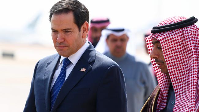 US Secretary of State Marco Rubio, left, is received by Saudi Arabia's Deputy Minister for Protocol Affairs Abdulmajeed al-Smari in Riyadh on Monday. Picture: AFP