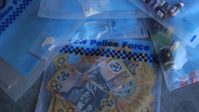 Cash and drug paraphernalia. Picture: NSW POLICE MEDIA