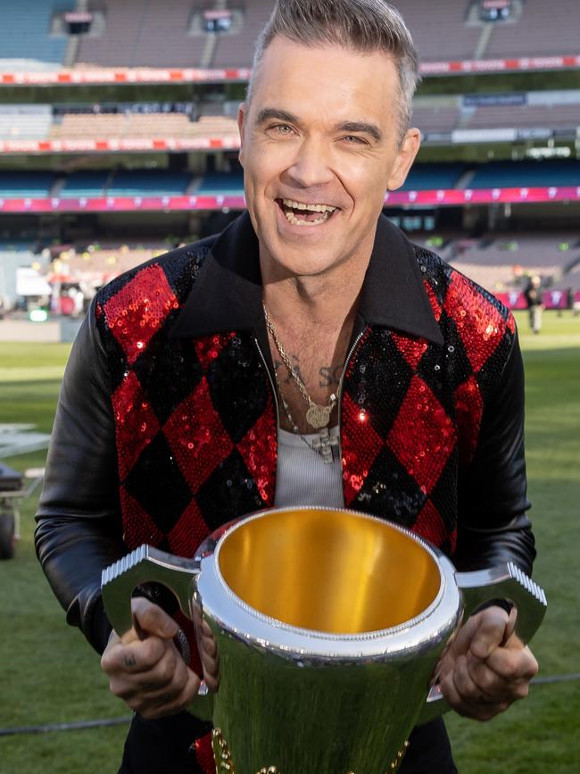 Robbie Williams says he’s ‘totally hooked’ on the Grand Final atmosphere. Picture: Jason Edwards