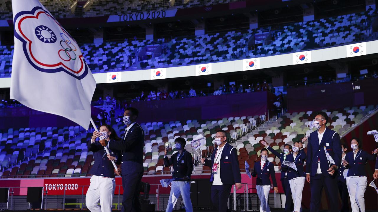 Flag bearers Hsing-Chun Kuo and Yen-Hsun Lu of Team Chinese Taipei during the Opening Ceremony of the Tokyo 2020 Olympic Games at Olympic Stadium on July 23. (Photo by Jamie Squire/Getty Images)