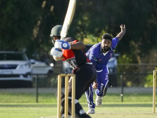 Parkmore bowler Niranjen Kumar goes at HSD. Picture: Valeriu Campan