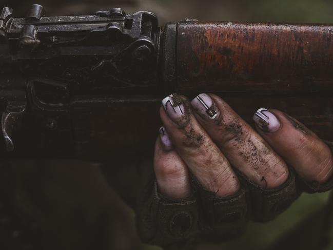 Signs of normal life – such as careful manicures – were soon lost in the mud. Picture: Ercin Erturk/Anadolu Agency via Getty Images