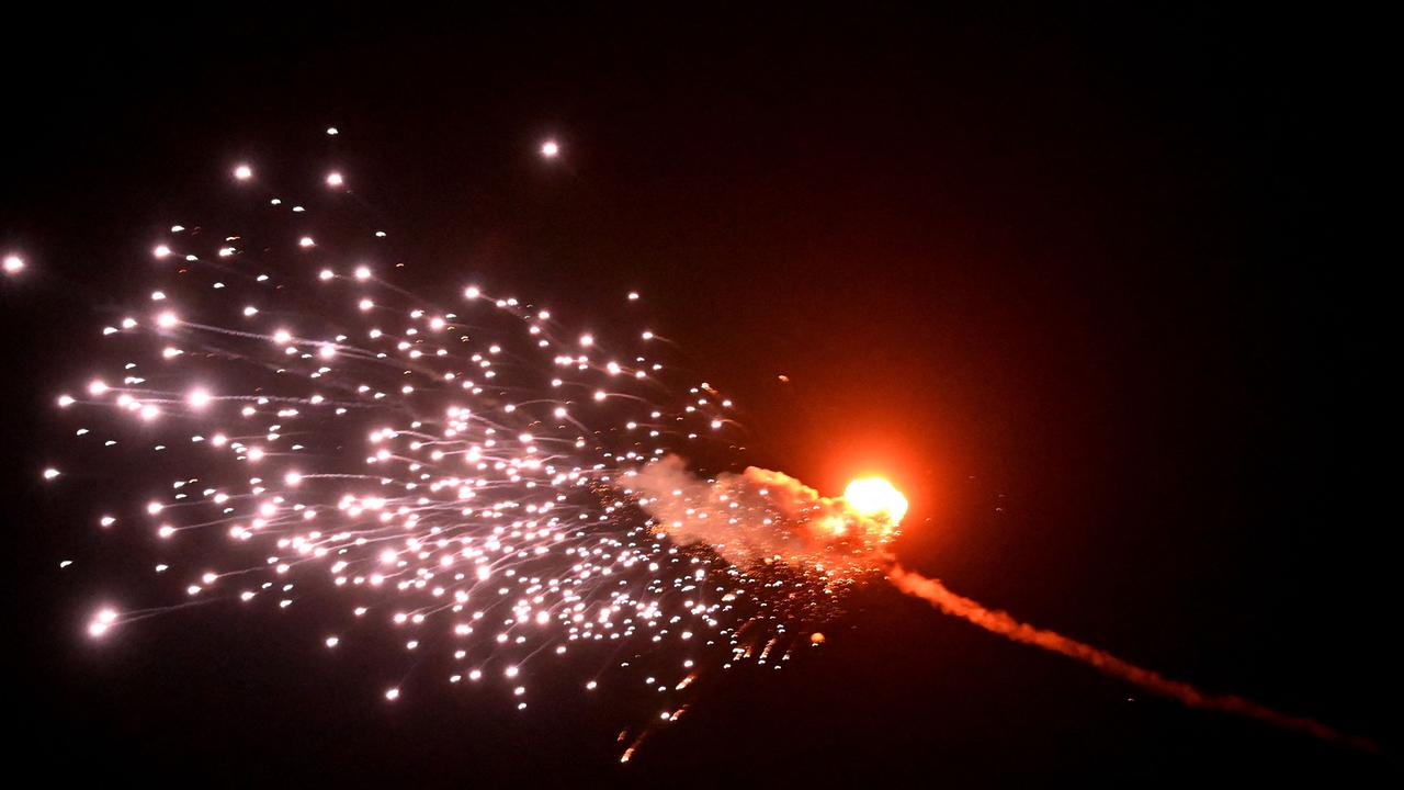 This photograph taken on May 28, 2023 in Kyiv shows the explosion of a drone after it was shot down during a massive Russian drone strike mainly targeting the Ukrainian capital. Picture: Sergei Supinsky/AFP