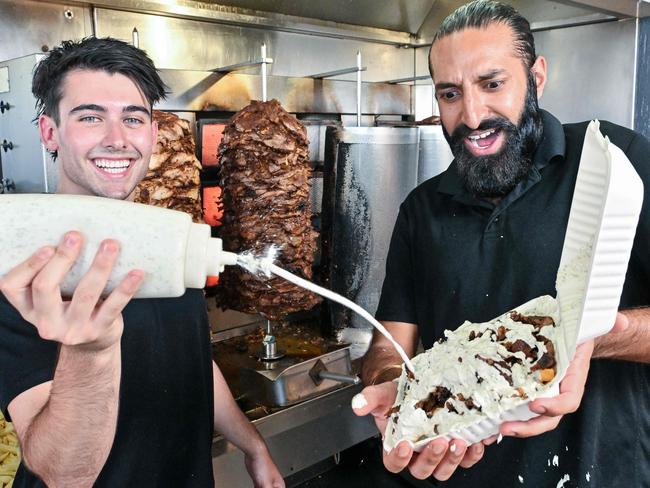 January 9, 2025: TikTok stars George Fournaros and Takhat Gill prepare an AB with their famous garlic sauce at The Yiros King in Reynella. Picture: Brenton Edwards