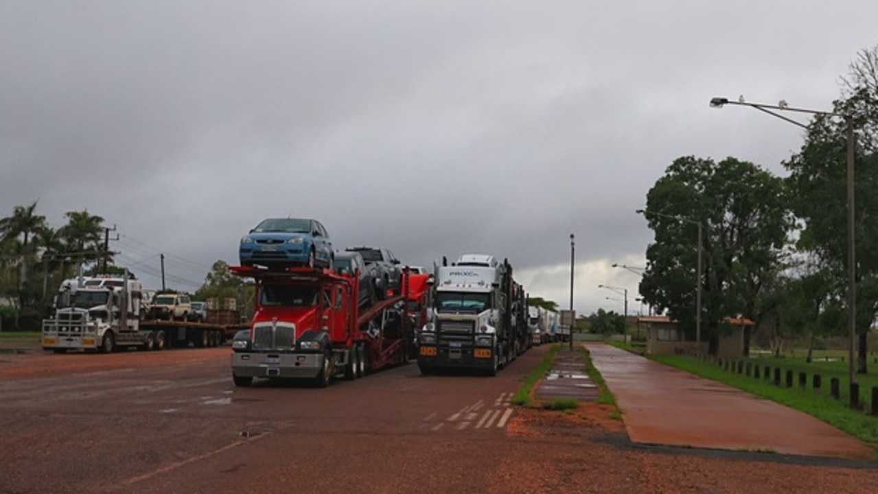 Trucks stuck at the Tennant Creek Weigh Bridge for the highway to open. Picture: David Curtis