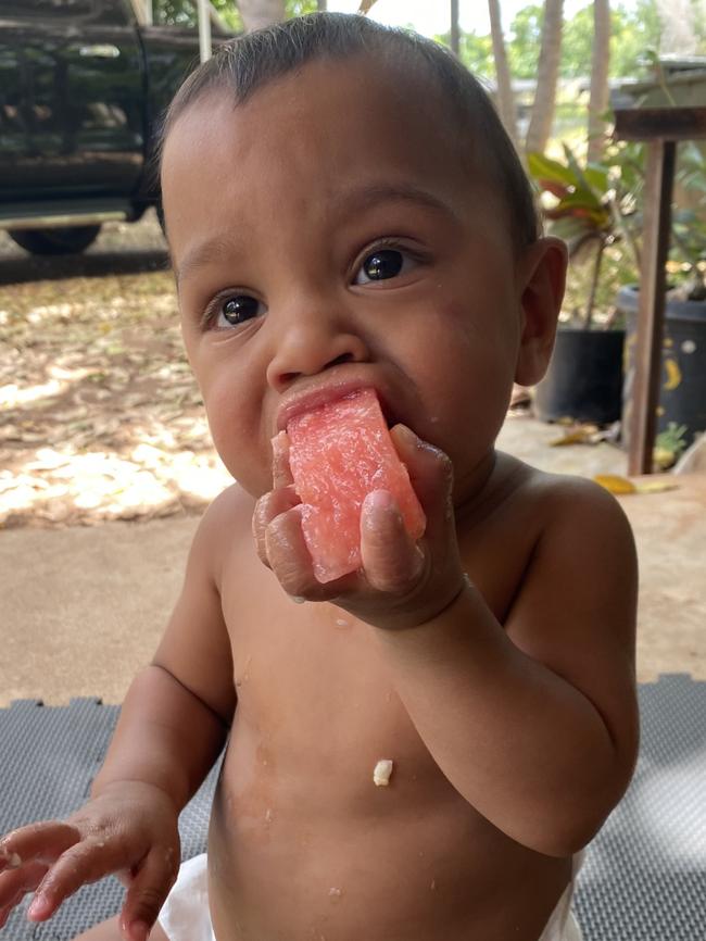 Waylon Walker, of Pine Creek, enjoying some yummy fruit. Says mum, Simona: “You wouldn’t think this big boy was born three months premature”.
