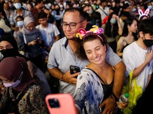 A couple celebrates in Kuala Lumpur. Picture: Reuters