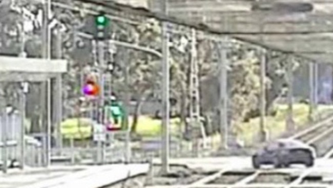 CCTV footage of the black Mercedes coupe at Diggers Rest railway crossing. Police believe murder victim Karen Ristevski’s body may be hidden in the car. Source: Victoria Police