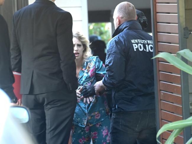 Raptor squad arrest Marjorie Griffiths at her home in Umina. Picture: Jeremy Piper