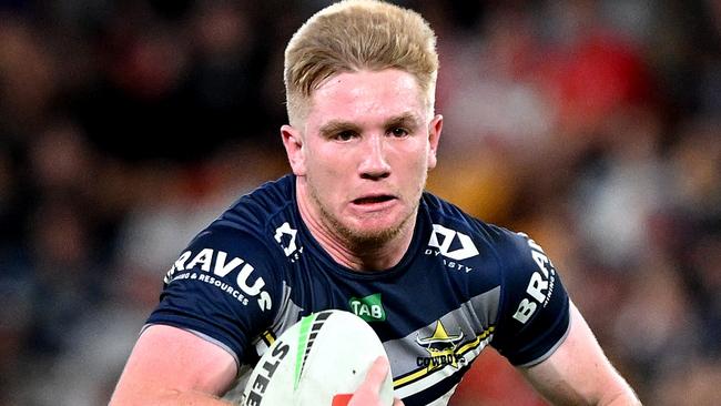 BRISBANE, AUSTRALIA - AUGUST 25: Tom Dearden of the Cowboys breaks away from the defence during the round 26 NRL match between Dolphins and North Queensland Cowboys at Suncorp Stadium on August 25, 2023 in Brisbane, Australia. (Photo by Bradley Kanaris/Getty Images)