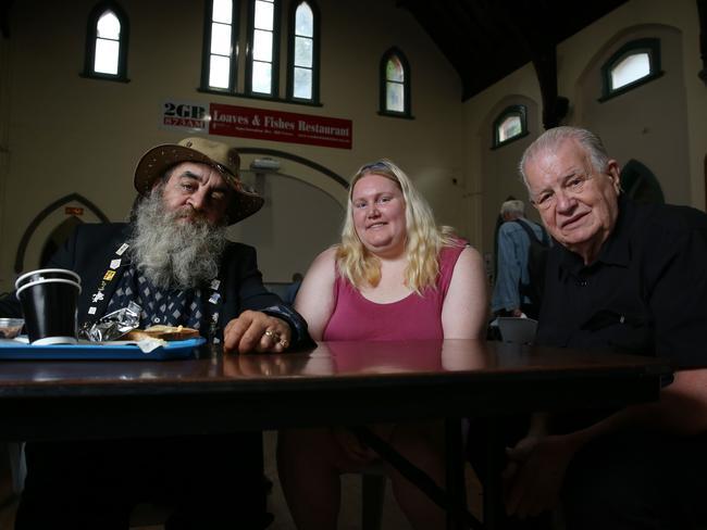 16/01/2025. Reverend Bill Crews supports homeless people at his charity and is desperately worried about the impact of the mental health crisis in NSW. Pictured with homeless residents Joe Karadjian, 61 and Kristen Bakers, 33 at breakfast time at BillÃs restaurant Loaves and Fishes, inside his church in Ashfield, in SydneyÃs inner-west. Britta Campion / The Australian