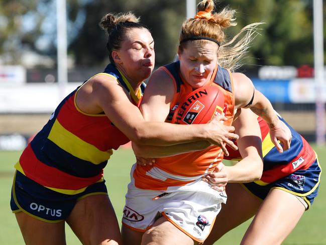 Ebony Marinoff tackles GWS’s Brittany Tully during their round six clash. Picture: AAP IMAGE/DAVID MARIUZ