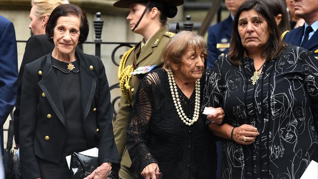 Marie Bashir (left) stands with family and friends outside the church. Picture: AAP Image/Dean Lewins