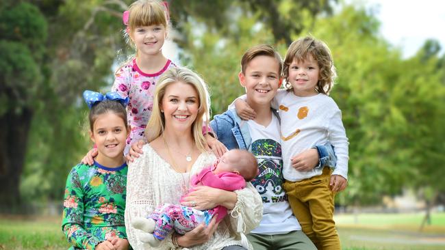 Lauren Newton and her five children Eva, 9, Lola, 7, Lauren with Perla, 3 months, Sam, 11 and Monty, 3. Picture: Nicki Connolly