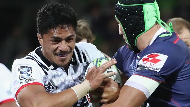 MELBOURNE, AUSTRALIA - MAY 04: Peter Samu of the Crusaders is challenged by Adam Coleman of the Rebels during the round 12 Super Rugby match between the Rebels and the Crusaders at AAMI Park on May 4, 2018 in Melbourne, Australia.  (Photo by Robert Cianflone/Getty Images)