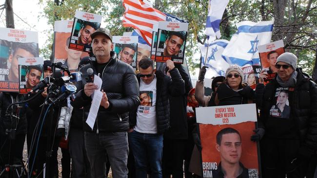 Adi Alexander, holding microphone, the father of Edan Alexander, addresses the crowd at a hostage deal rally in New York. Picture: Hostages Families Forum