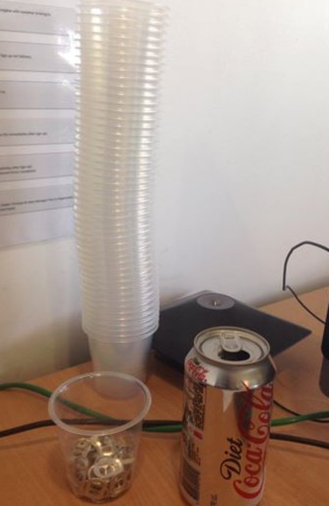 This humble desk stack of used plastic cups was sent in by reader Nicole Landsberry, who works at a car yard in Mt Isa, Queensland. She also collects ring pulls from her Diet Coke. Onya, Nicole.