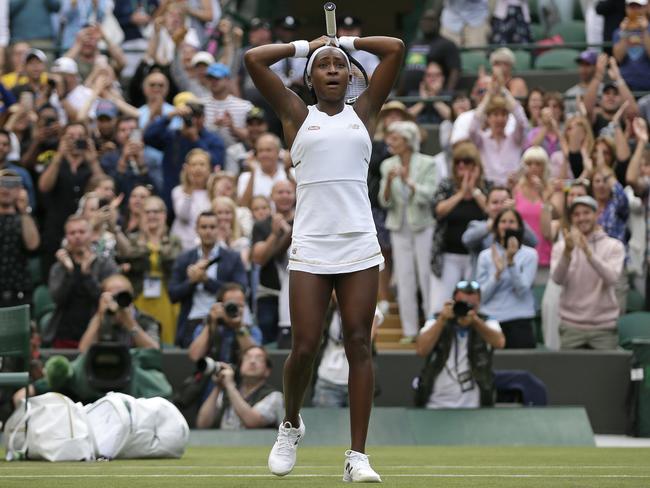 United States' Cori "Coco" Gauff reacts after beating United States's Venus Williams in a Women's singles match during day one of the Wimbledon Tennis Championships in London, Monday, July 1, 2019. (AP Photo/Tim Ireland)