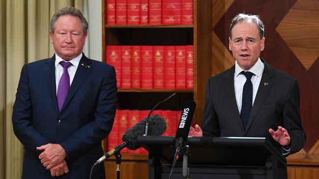 Businessman Andrew Forrest and Health Minister Greg Hunt at the press conference in Melbourne on Wednesday.