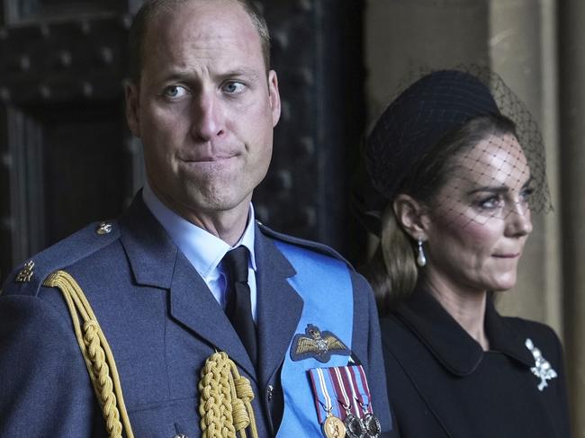 LONDON, ENGLAND - SEPTEMBER 14:  Prince William, Prince of Wales, Catherine, Princess of Wales, Prince Harry, Duke of Sussex, and Meghan, Duchess of Sussex leave after escorting the coffin of Queen Elizabeth II to Westminster Hall from Buckingham Palace for her lying in state, on September 14, 2022 in London, United Kingdom. Queen Elizabeth II's coffin is taken in procession on a Gun Carriage of The King's Troop Royal Horse Artillery from Buckingham Palace to Westminster Hall where she will lay in state until the early morning of her funeral. Queen Elizabeth II died at Balmoral Castle in Scotland on September 8, 2022, and is succeeded by her eldest son, King Charles III. (Photo by Emilio Morenatti - WPA Pool/Getty Images)