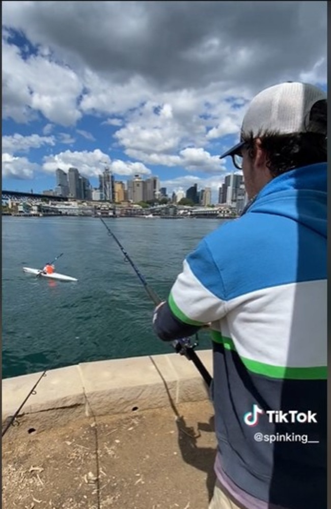 An angler has hooked a kayaker on Sydney Harbour in wild scenes. Picture: TikTok/@spinking__