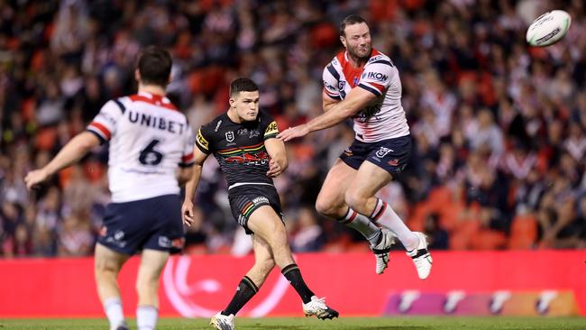 Penrith halfback Nathan Cleary kicks the winning field goal against the Sydney Roosters at Panthers Stadium. Picture Getty Images