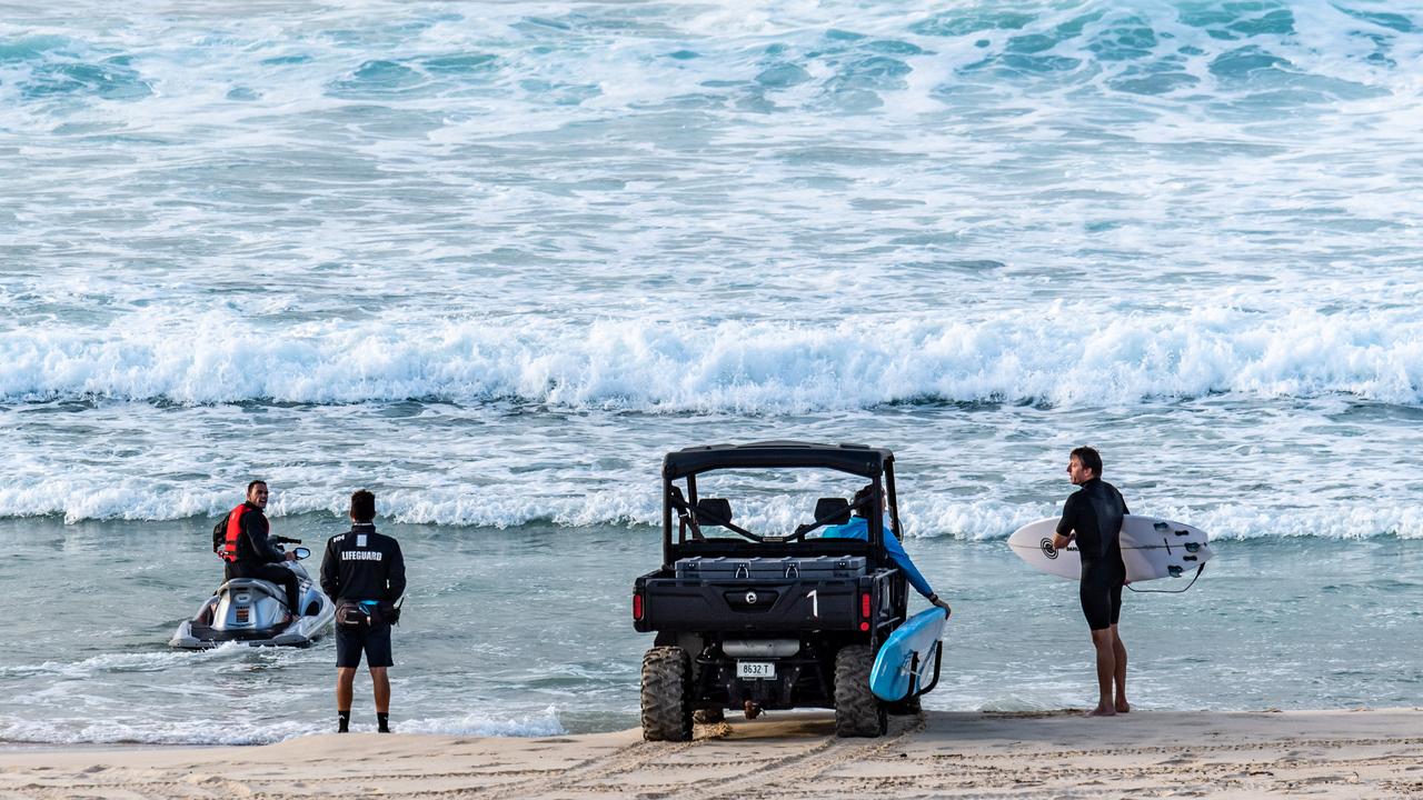 People were ordered to stop surfing by lifeguards. Picture: Monique Harmer