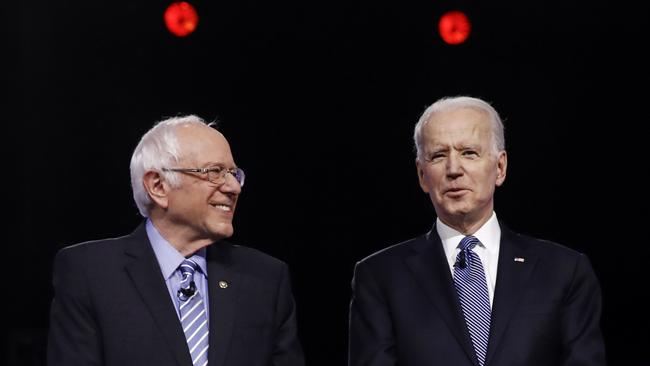 Senator Bernie Sanders (left) has dropped out of the Democratic presidential race, leaving a clear path for Joe Biden (right) to challenge Donald Trump. Picture: AP