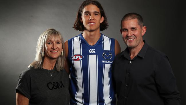 North Melbourne recruit Flynn Perez with his mum Narelle and dad Peter. Picture: Michael Klein