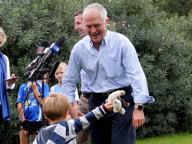 Pic of Jack Turnbull Brown 2 running towards Grand dad P.M a hug during press conference.P.M Malcolm Turnbull along with education Minister Simon Birmingham announce new education policy at Lough park Double Bay.