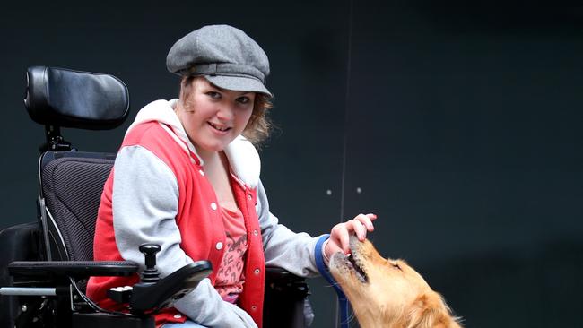 Sophie with her dog Willow at the Assistance dogs Australia graduation ceremony in Martin Place.