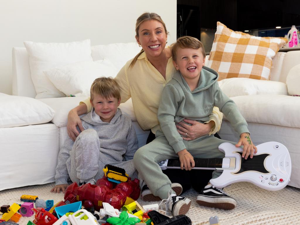 Veronica Douglas with her sons Aston and Oliver. Children’s toys are big consumers of batteries. Picture: Supplied