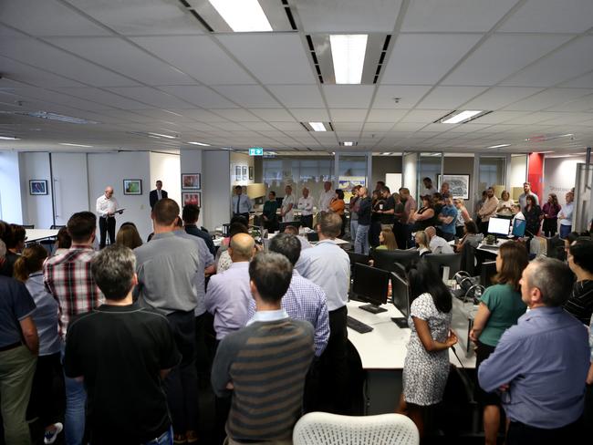 Staff at AAP in Sydney gather for the closure announcement. Picture: AAP