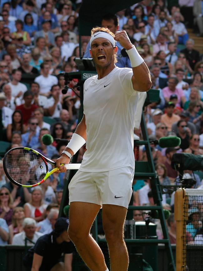 World No. 1 Rafael Nadal celebrates a point against Nick Kyrgios.