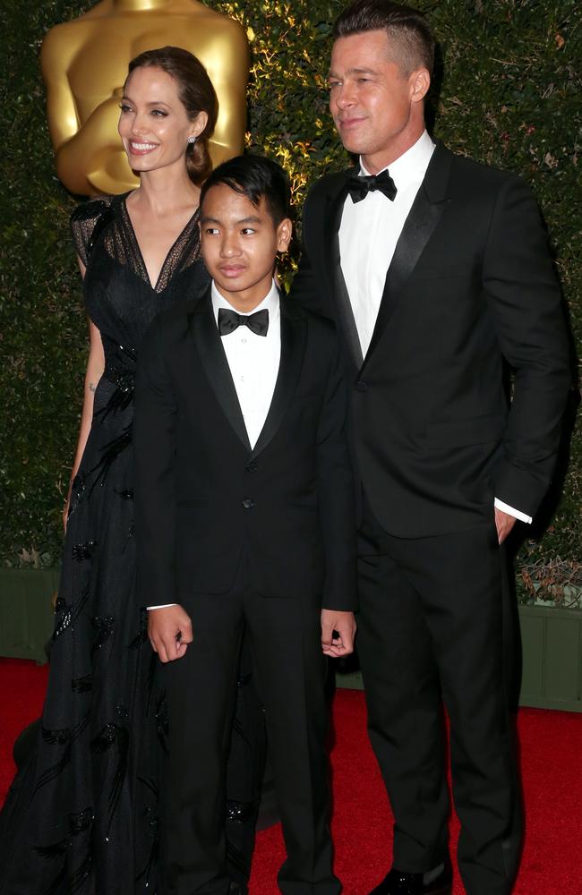 Angelina Jolie, Maddox Jolie-Pitt and Brad Pitt pictured together in 2013. The father and son have reportedly had a fractured relationship in recent years. Picture: Getty Images.