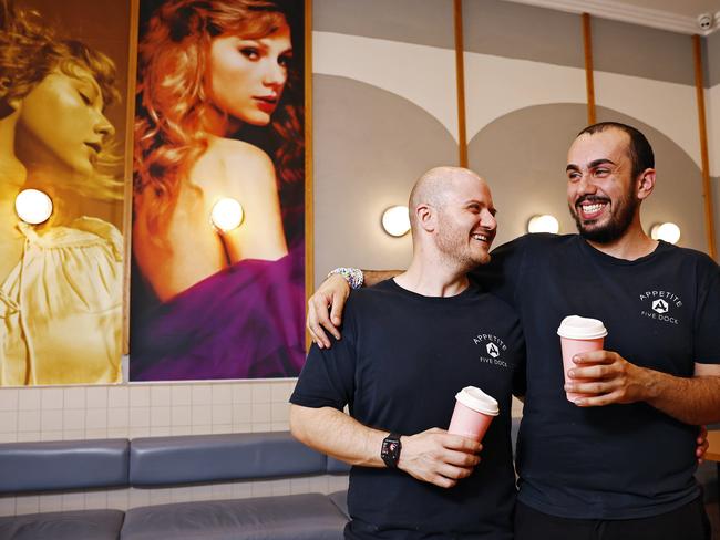 WEEKEND TELEGRAPH - 28.12.23MUST NOT PUBLISH  BEFORE CLEARING WITH PIC EDITOR  - Adrian Pizzolato (left) and Phillip Salhab (right) from Appetite cafe in Five Dock, pictured in their cafe that will be transformed into a Taylor Swift shrine next month.  Picture: Sam Ruttyn