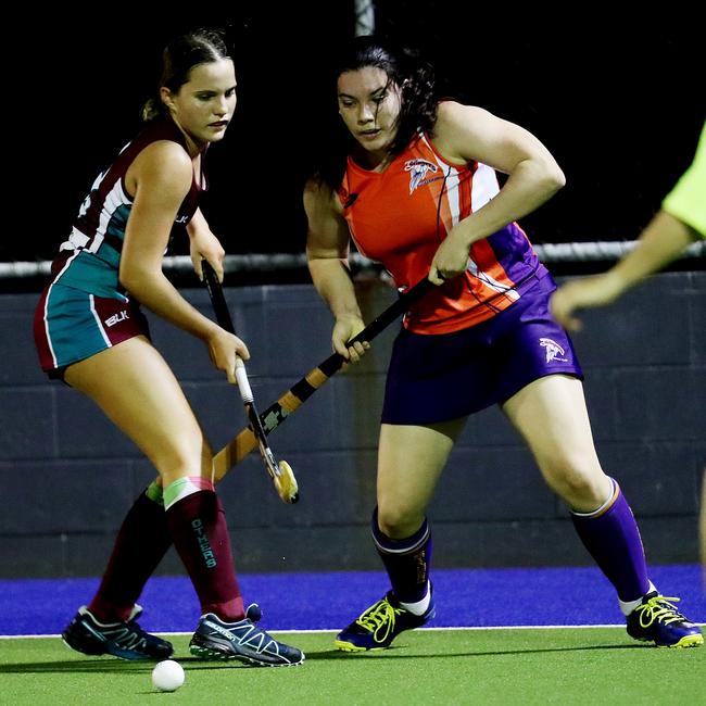 Cairns Hockey Association - Round 3. Brothers v Stingers (A-grade women’s). Brothers' Ruby McMenamin and Stingers' Lani Fitzsimmons. PICTURE: STEWART McLEAN