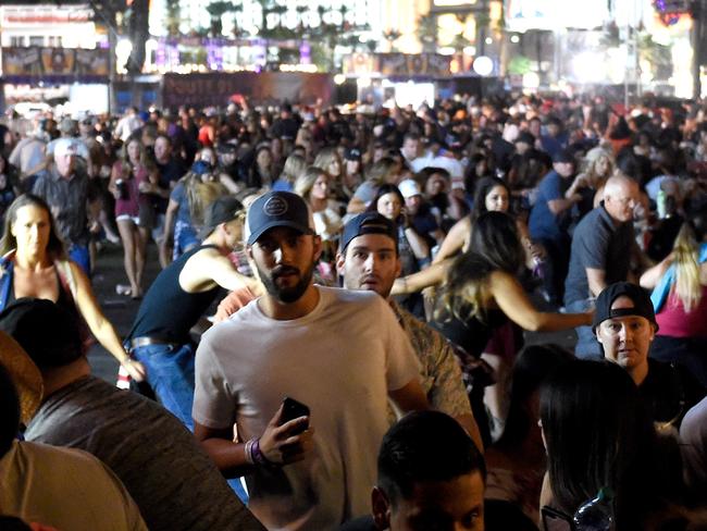 People flee the Route 91 Harvest country music festival grounds Picture: David Becker/Getty Images/AFP