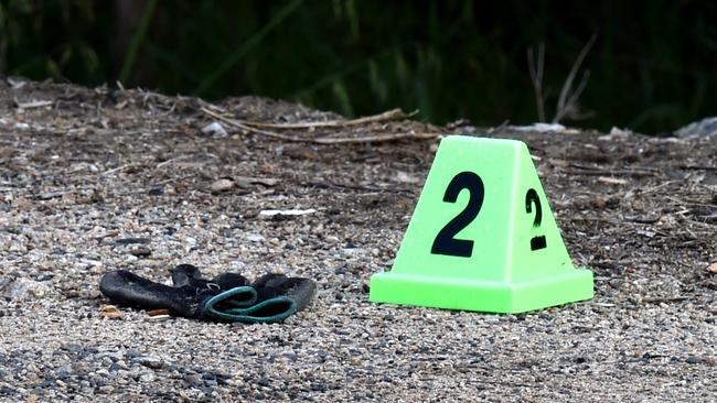 A police marker identifies where a glove has been found. Picture: Nicole Garmston