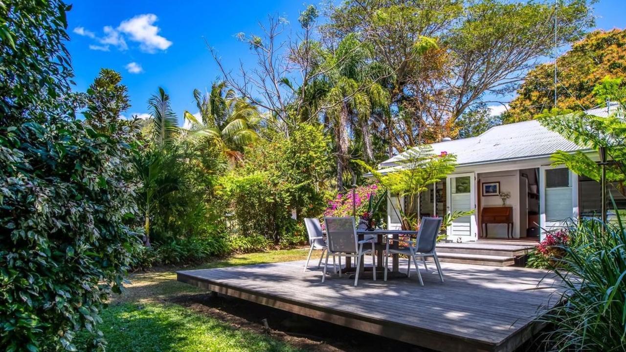 Architect Gary Hunt turned an old cane farm into a $100,000-plus second income earner. The 53ha Mayfield Farm on the outskirts of Port Douglas has two-thirds of its backyard as a fully working cane farm. Most of the other third is fenced off as paddocks rented out as horse agistments to local equestrians, while a small portion covers the helipad and heli-garage, two converted cane cutter cottages, with plans to put self-contained studios by the river to be holiday let — making this one of the highest paid backyards in Queensland.