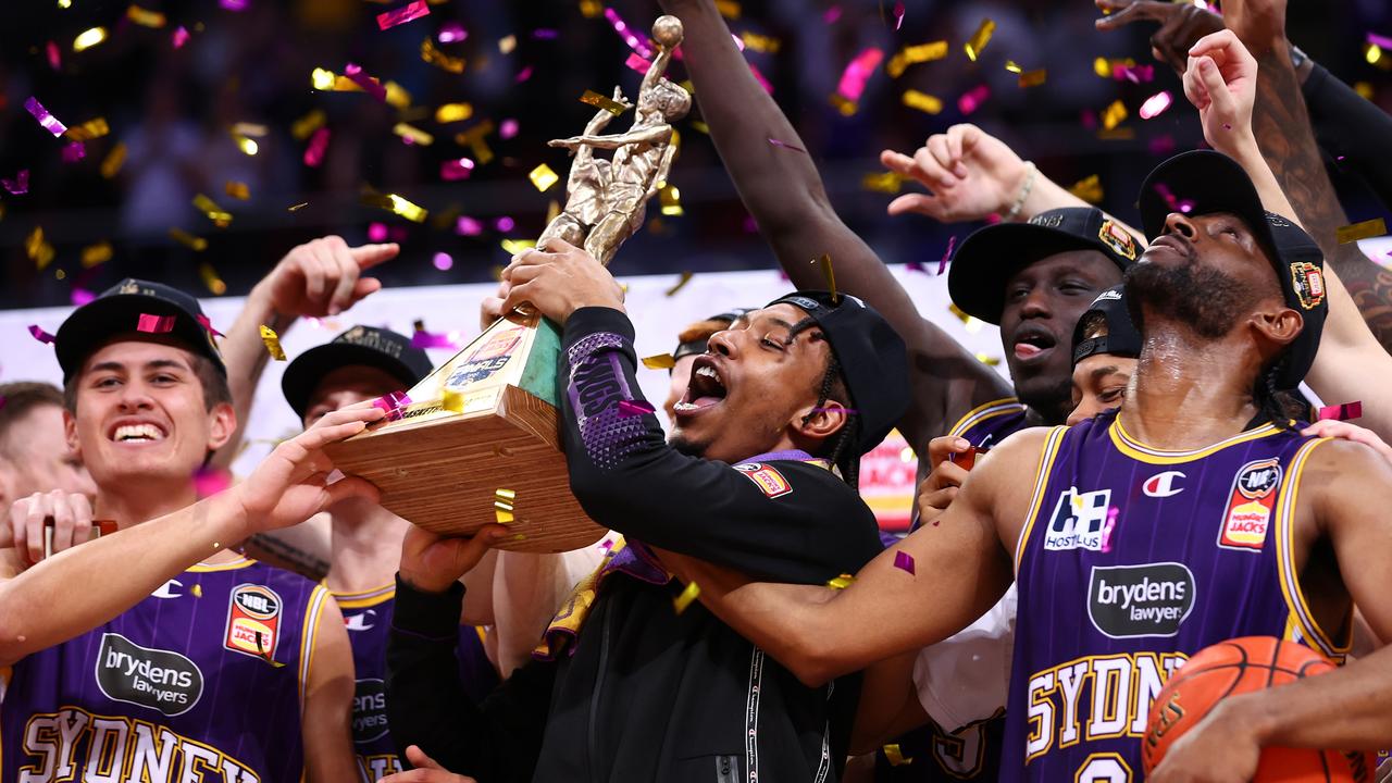 SYDNEY, AUSTRALIA - MAY 11: The Sydney Kings celebrate victory in game three of the NBL Grand Final series between Sydney Kings and Tasmania JackJumpers at Qudos Bank Arena on May 11, 2022 in Sydney, Australia. (Photo by Mark Metcalfe/Getty Images)