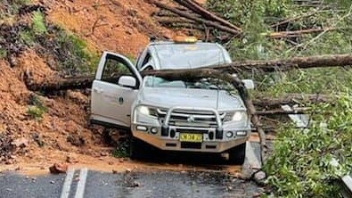 Car stranded by landslide in Dorrigo