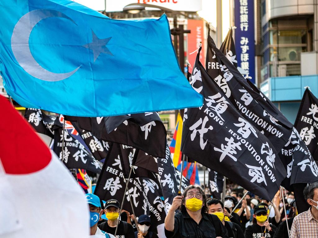 The protesters cited China’s treatment of Uyghur Muslims as part of the reason for the boycott. Picture: Philip FONG / AFP.